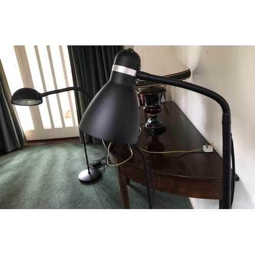 4105 - A pair of modern black floor lamps with adjustable shades, tallest approx. 139cm high, (both working... 