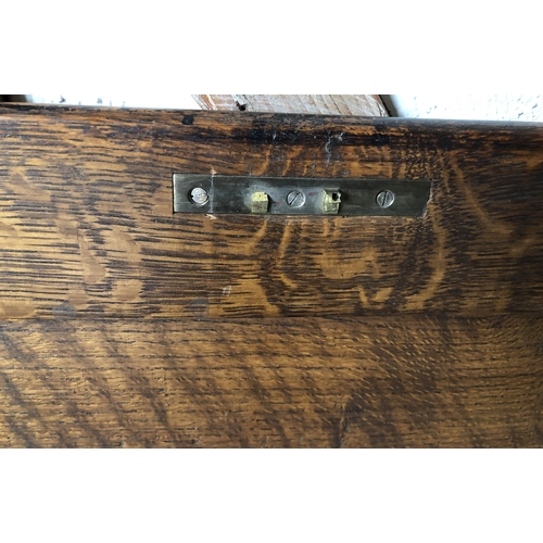 4111 - A good quality oak trunk with hinged lid enclosing open storage to interior, (no key, slight rubs an... 