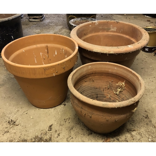 4115 - 3 modern terracotta garden pots, largest 14cm diameter, 34cm high. (3) Item not held by P.F Windiban... 