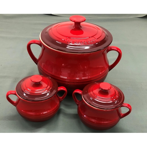 4122 - A large red Le Creuset 2-handled soup pot with lid and 6 matching 2-handled individual soup pots wit... 