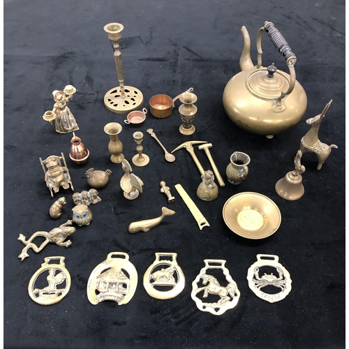 4125 - A quantity of mixed brass including a teapot, small animal ornaments, bell, candlestick etc.