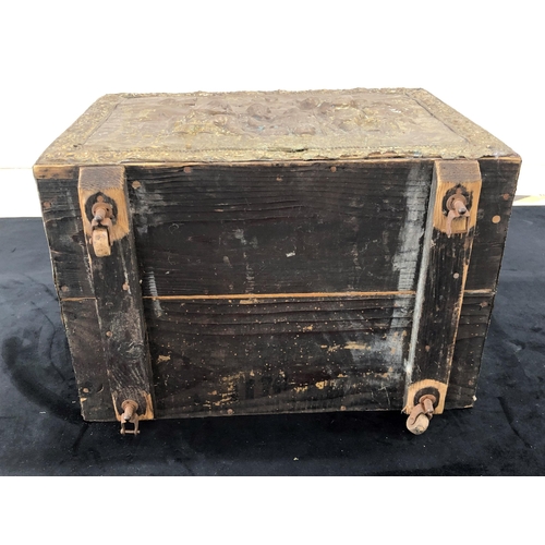 4133 - A wooden coal box with beaten copper panels to sides and top, hinged lid enclosing open storage area... 