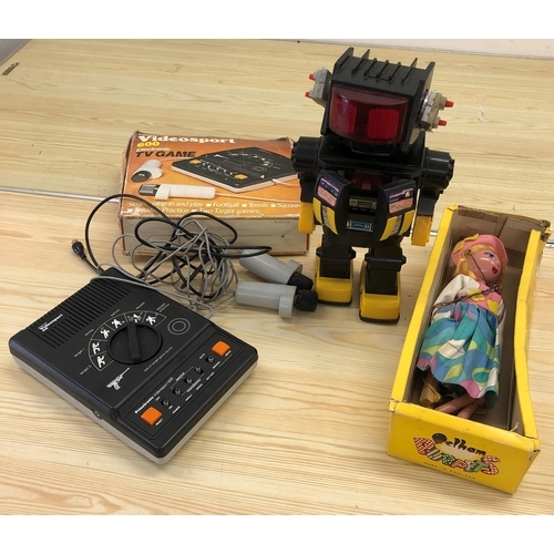 4020 - A child's toy robot, 30.5cm, a Pelham puppet with part box and a Prinztronic Video Sport 600 electri... 