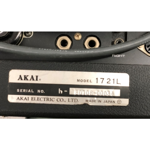 4069 - An Akai reel to reel tape recorder, model 1721L, serial No 80708-00034, H36cm, a quantity of film re... 