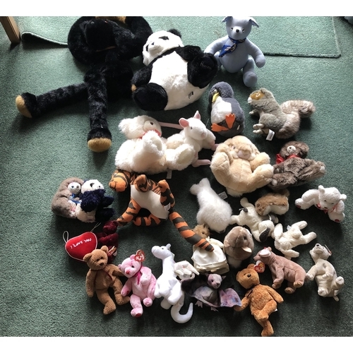 4097 - A quantity of mixed soft toys including TY beanies, a large dog hand puppet with A.T. Harper label e... 