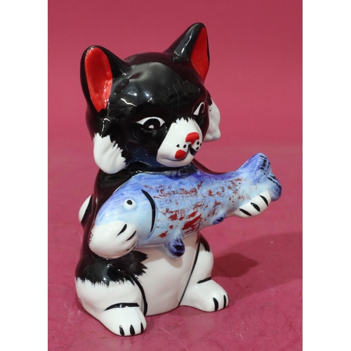 10 - A Lorna Bailey Art Deco style china figure of a seated cat holding a fish, 12.5cm high