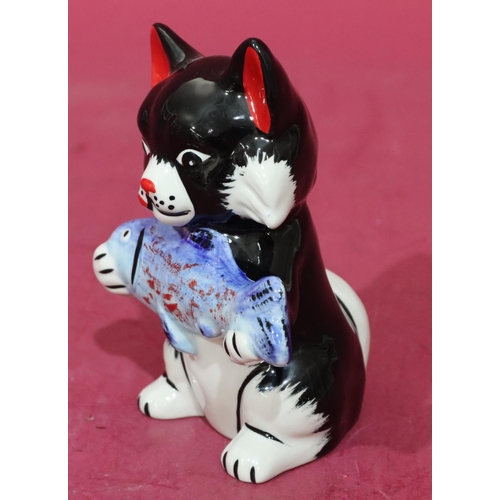 10 - A Lorna Bailey Art Deco style china figure of a seated cat holding a fish, 12.5cm high