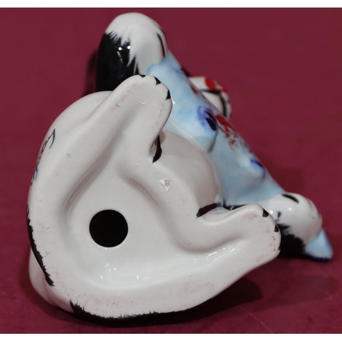 10 - A Lorna Bailey Art Deco style china figure of a seated cat holding a fish, 12.5cm high