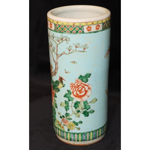 129 - A 19th/20th Century Chinese cylindrical umbrella stand on pale blue ground with multi-coloured bird,... 