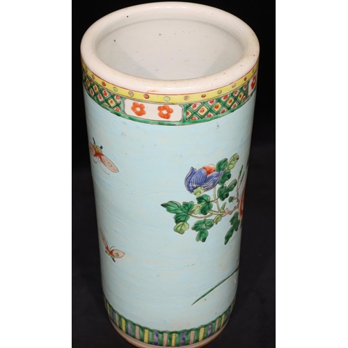 129 - A 19th/20th Century Chinese cylindrical umbrella stand on pale blue ground with multi-coloured bird,... 