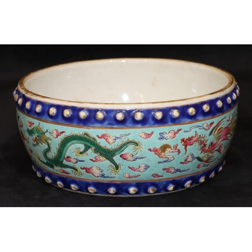 130 - A Chinese Tao-Kuang period round bulbous shaped bowl on pale turquoise ground with multi-coloured dr... 