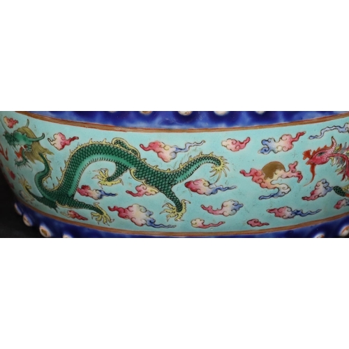 130 - A Chinese Tao-Kuang period round bulbous shaped bowl on pale turquoise ground with multi-coloured dr... 