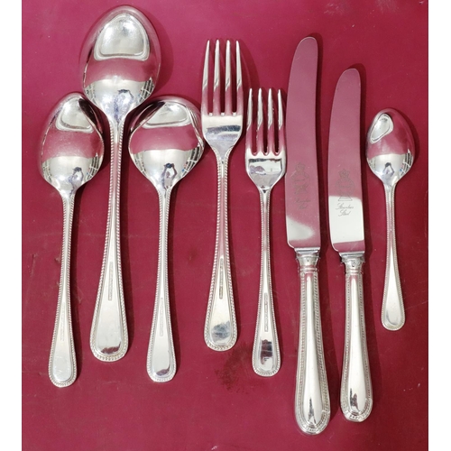 221 - A silver plated 6 place setting flatware service with ball rim, comprising of a pair of servicing sp... 