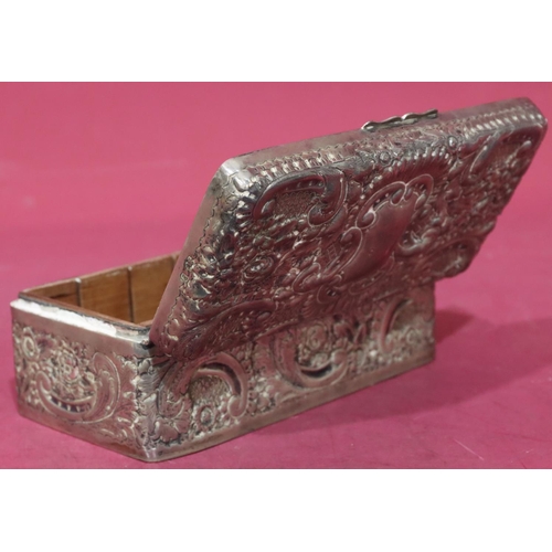 227 - A Victorian silver rectangular shaped cigarette box with allover embossed floral, leaf and scroll de... 