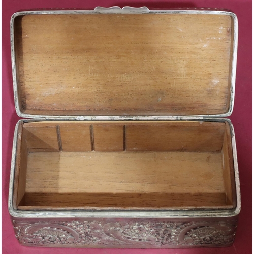 227 - A Victorian silver rectangular shaped cigarette box with allover embossed floral, leaf and scroll de... 