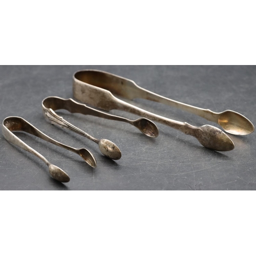 232 - A pair of Georgian silver sugar tongs and 2 further pairs of silver sugar tongs, 1.9oz (3)