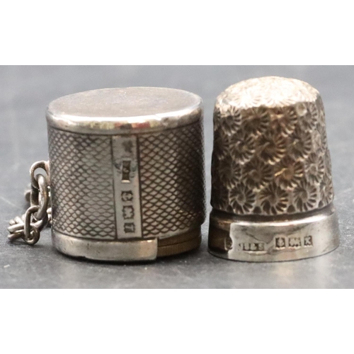 234 - A Birmingham silver coin holder with engine turned decoration mounted with keyring holding 11 variou... 