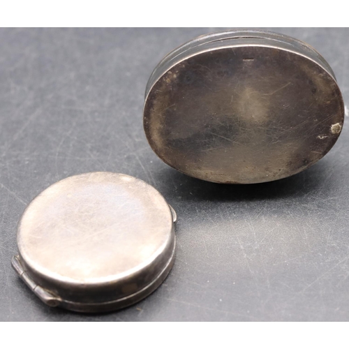 235 - A 925 silver pill box with raised rabbit motif and hinged lid and a silver circular pill box with hi... 