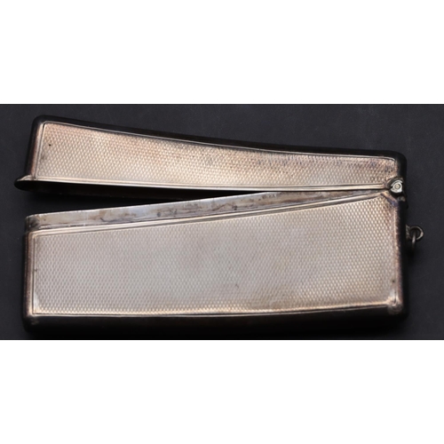 237 - A London silver concaved shaped card case with hinged top and engine turned decoration, 1.3oz 9cm lo... 