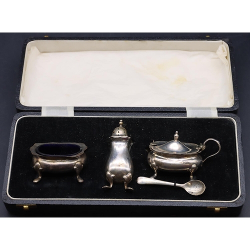 240 - A 3-piece Chester silver cruet with scallop shaped rims on splayed feet comprising mustard with blue... 