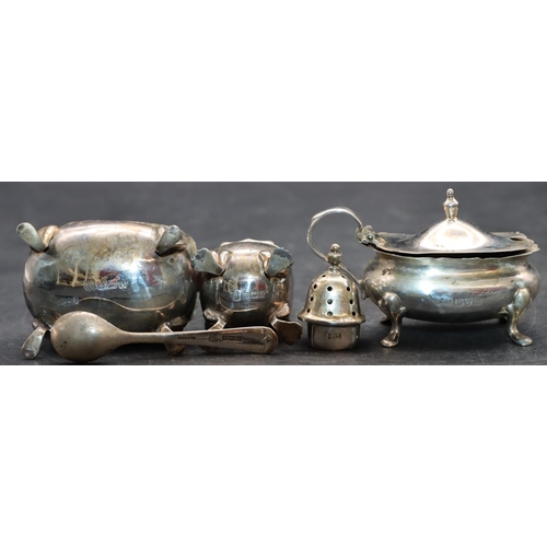 240 - A 3-piece Chester silver cruet with scallop shaped rims on splayed feet comprising mustard with blue... 