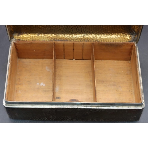 243 - An Edward VII hammered silver rectangular shaped cigarette box with hinged lid enclosing cedar linin... 