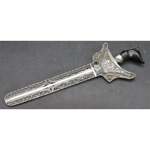 249 - A small Eastern silver coloured metal Kris with horn handle and blade with silver coloured sheath, 2... 