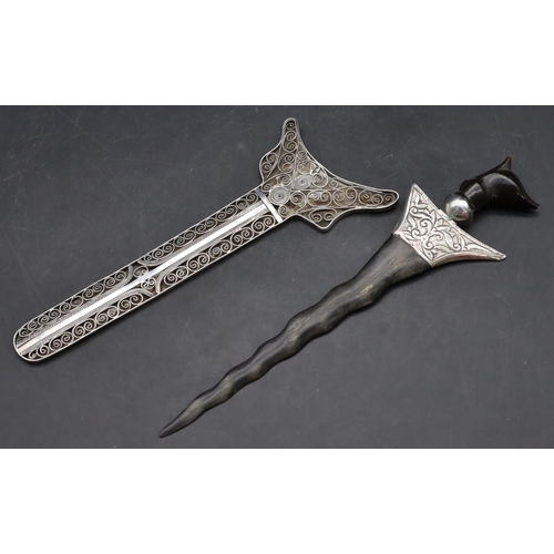 249 - A small Eastern silver coloured metal Kris with horn handle and blade with silver coloured sheath, 2... 