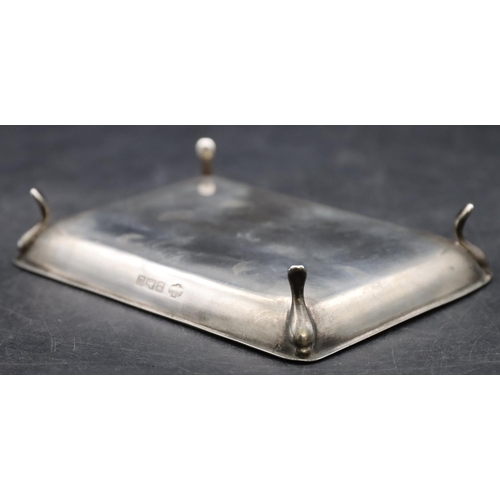 262 - A Birmingham silver small rectangular shaped dish on 4 splayed feet, 10.2cm wide, 1.5 oz