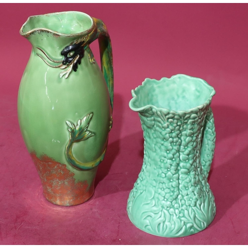 27 - Konny Kraft round bulbous jug with raised dragon handle on green ground, 31cm high and a Sylvac jug ... 