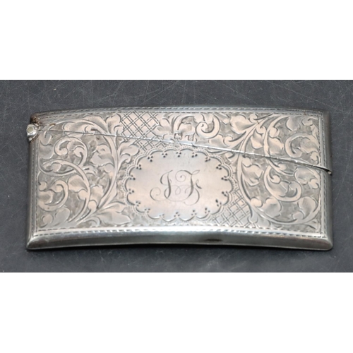 280 - A Birmingham silver concaved shaped card case with hinged top and allover engraved leaf and scroll d... 