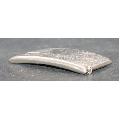 280 - A Birmingham silver concaved shaped card case with hinged top and allover engraved leaf and scroll d... 