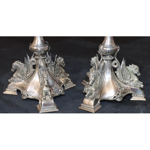 283 - A pair of 19th Century silver plated comport stands on turn stems with raised winged horses on tri-p... 