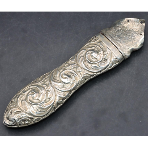 284 - A Birmingham silver handled paper knife (no blade) with embossed scroll handle, 14cm long