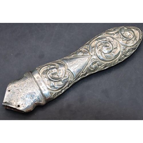 284 - A Birmingham silver handled paper knife (no blade) with embossed scroll handle, 14cm long