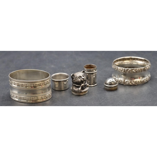 285 - A miniature Birmingham silver pepperette, 3cm high, a modern silver child's tooth pot with cover in ... 