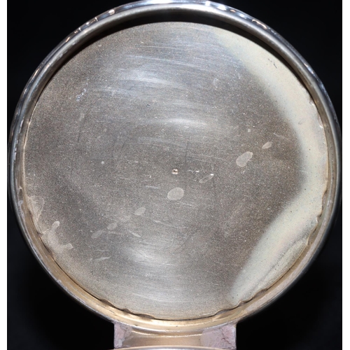 286 - A Birmingham silver round trinket box with engraved hinged lid depicting crest 