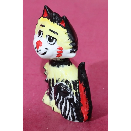 4 - A Lorna Bailey Art Deco style china figure of a seated cat on yellow, black and red ground, 13.5cm