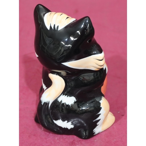 5 - A Lorna Bailey Art Deco style china figure of a cat holding a heart, 13cm high