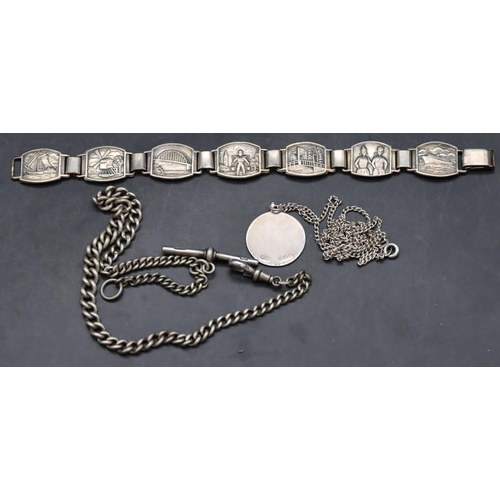 547 - A graduated silver watch chain with T-bar, a silver circular pendant with chain and a Continental si... 