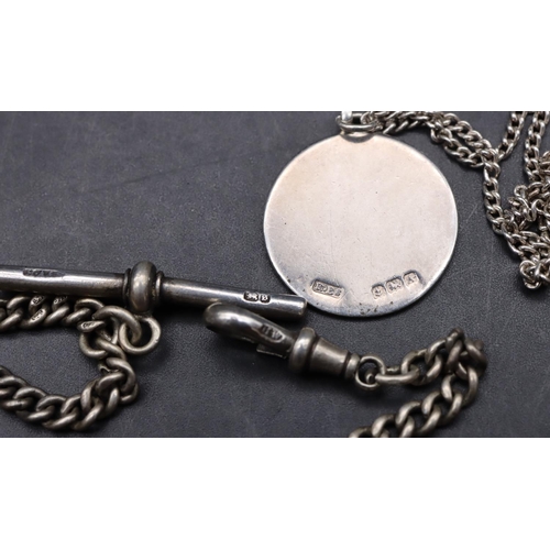 547 - A graduated silver watch chain with T-bar, a silver circular pendant with chain and a Continental si... 