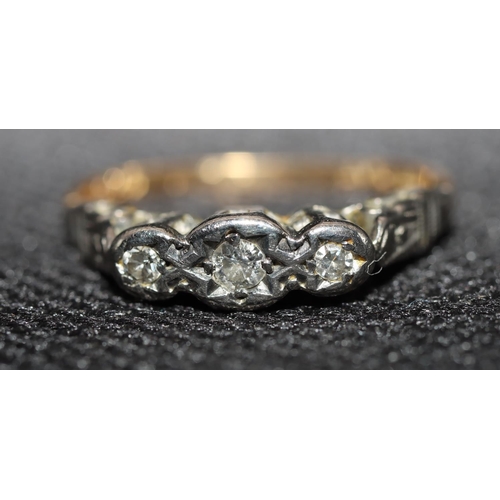 556 - An 18ct gold and platinum ladies' small 3-stone diamond ring, Size N, 2.2 grams gross