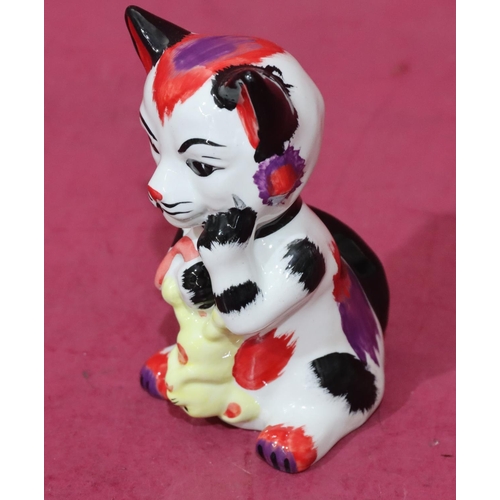 6 - A Lorna Bailey Art Deco style china figure of a seated cat holding a mouse, 12.5cm high