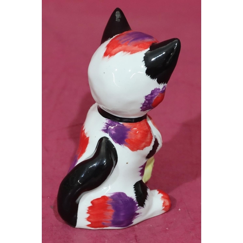 6 - A Lorna Bailey Art Deco style china figure of a seated cat holding a mouse, 12.5cm high