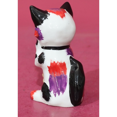 6 - A Lorna Bailey Art Deco style china figure of a seated cat holding a mouse, 12.5cm high