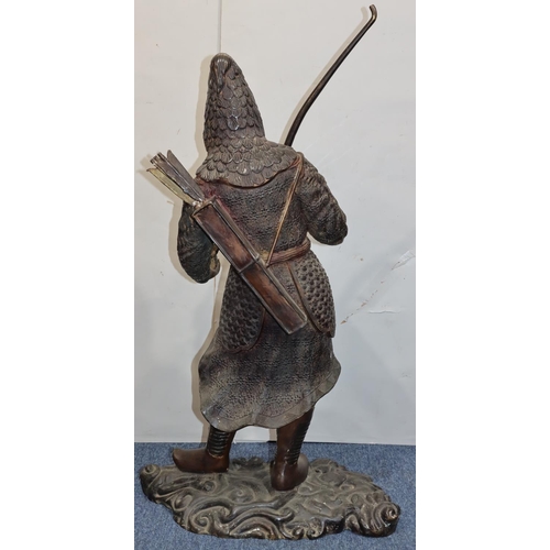 606 - A large bronze figure of a Samurai warrior holding a bow and  young chick on scallop shaped base (bo... 