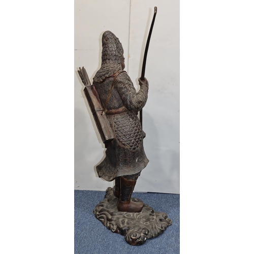 606 - A large bronze figure of a Samurai warrior holding a bow and  young chick on scallop shaped base (bo... 