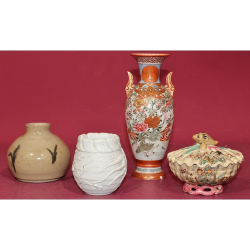 61 - An Oriental round bulbous thin necked 2-handled vase on white and red ground with multi-coloured fig... 