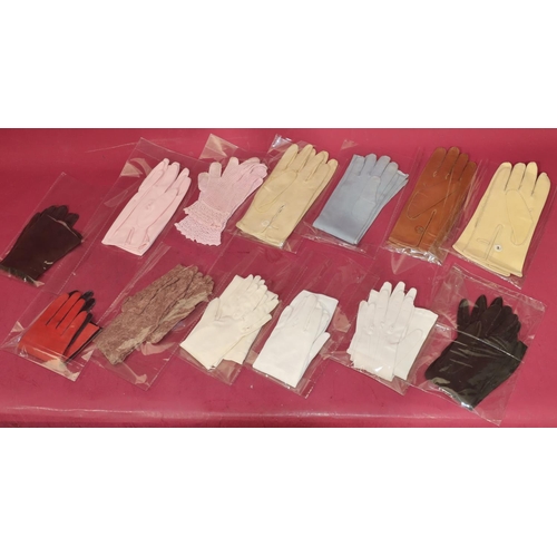 615 - A collection of various leather, silk and other gloves