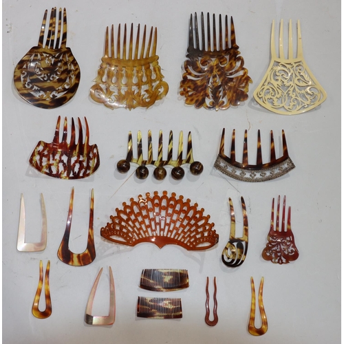 618 - A quantity of various hair slides and combs